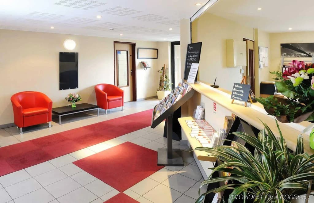 Séjours & Affaires Paris Nanterre - Photo 2