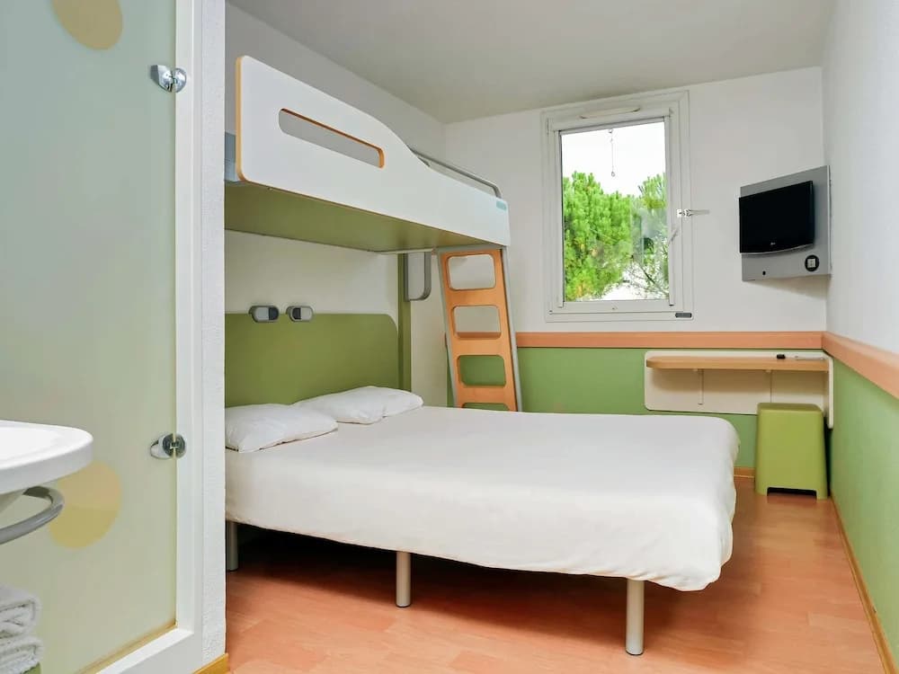 Ibis budget Montpellier Millènaire - Photo 4