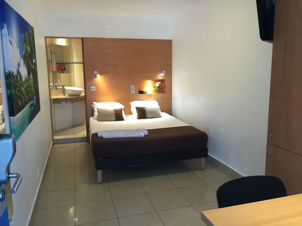 Karaibes Hotel - Photo 2