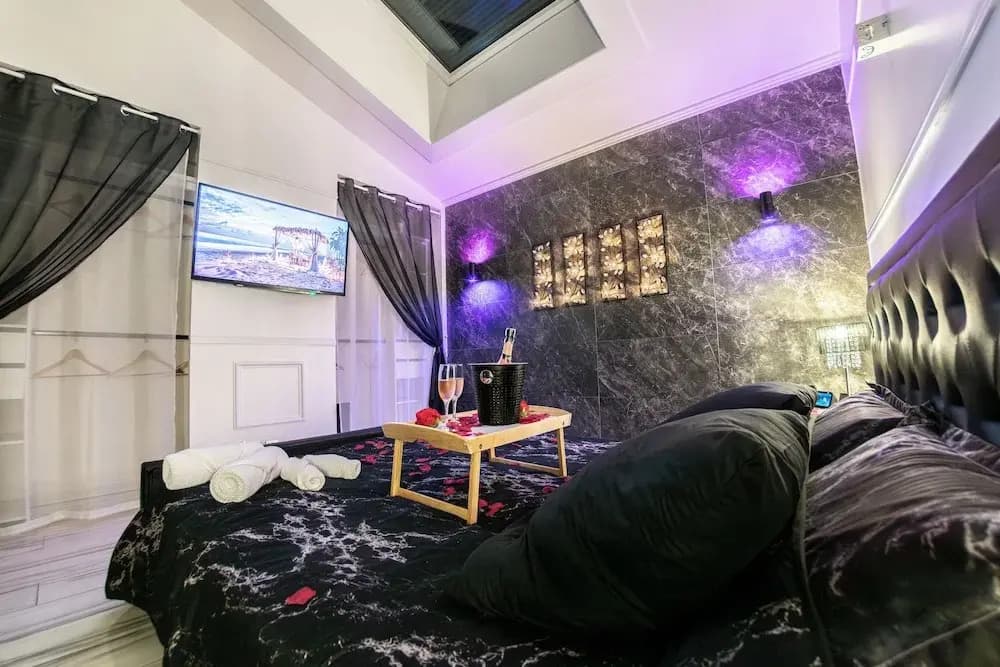 Appart Hotel GLAM88 Suites SPA et SAUNA - Photo 4