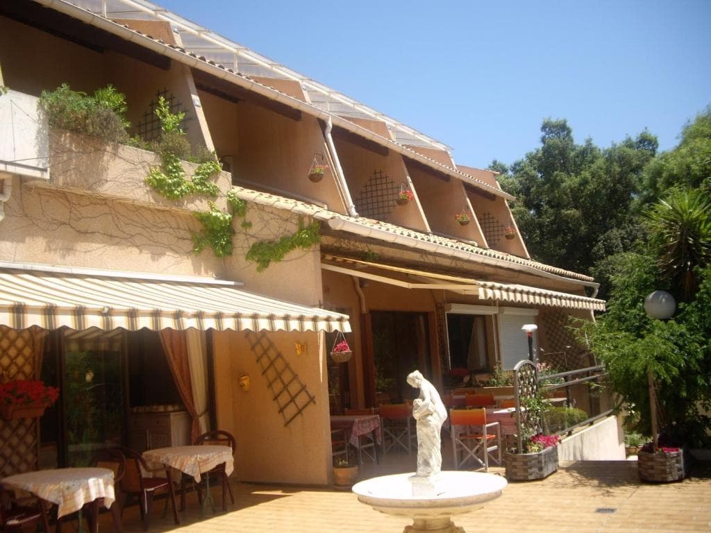 Hôtel Les Palmiers - Miniature 7