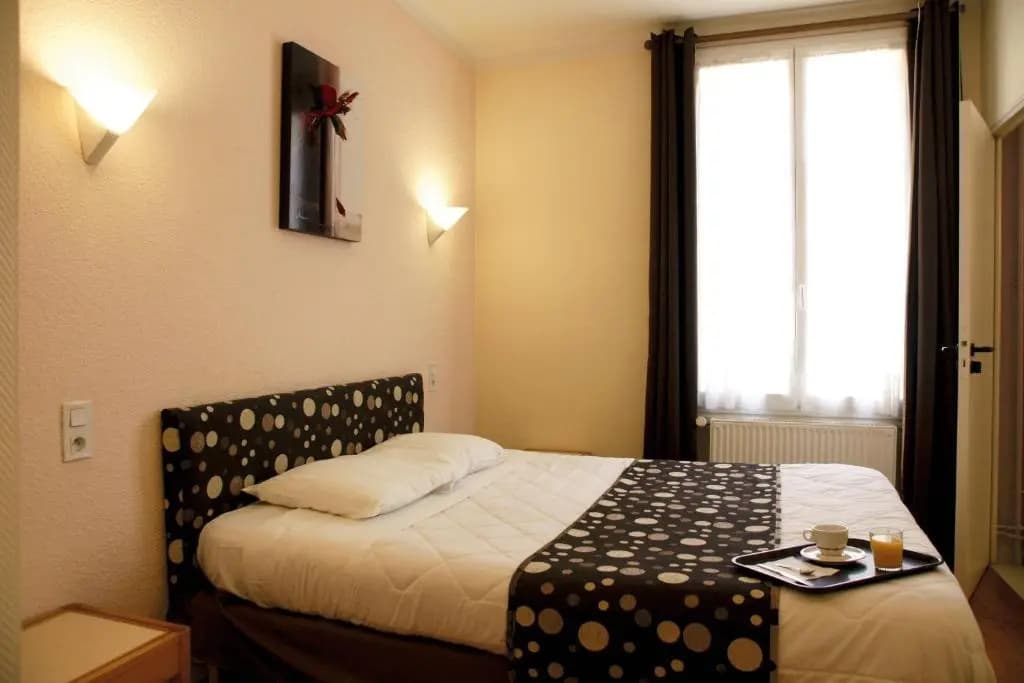 Hotel De la Place - Photo 1