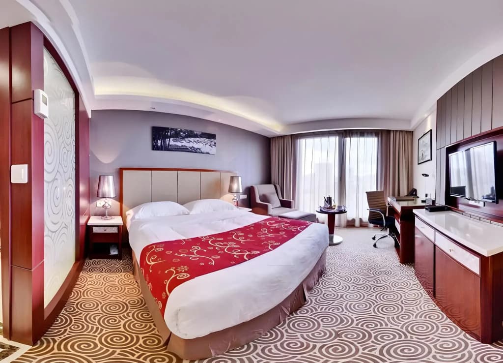 Huatian Chinagora Hotel - Photo 4