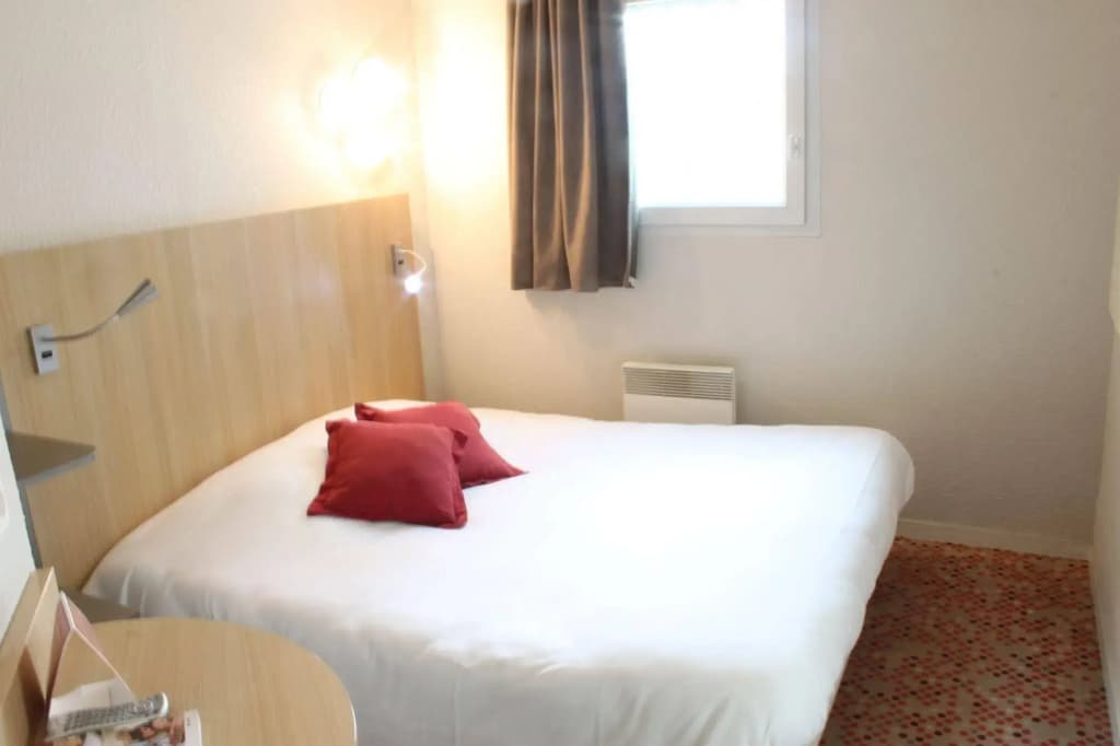 Welcomotel Coignières - Photo 5