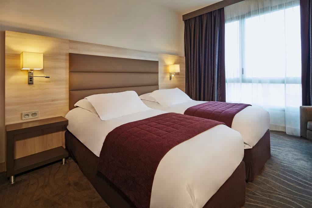 Kyriad Prestige Lyon Est - Saint Priest Eurexpo Hotel and Spa - Photo 3