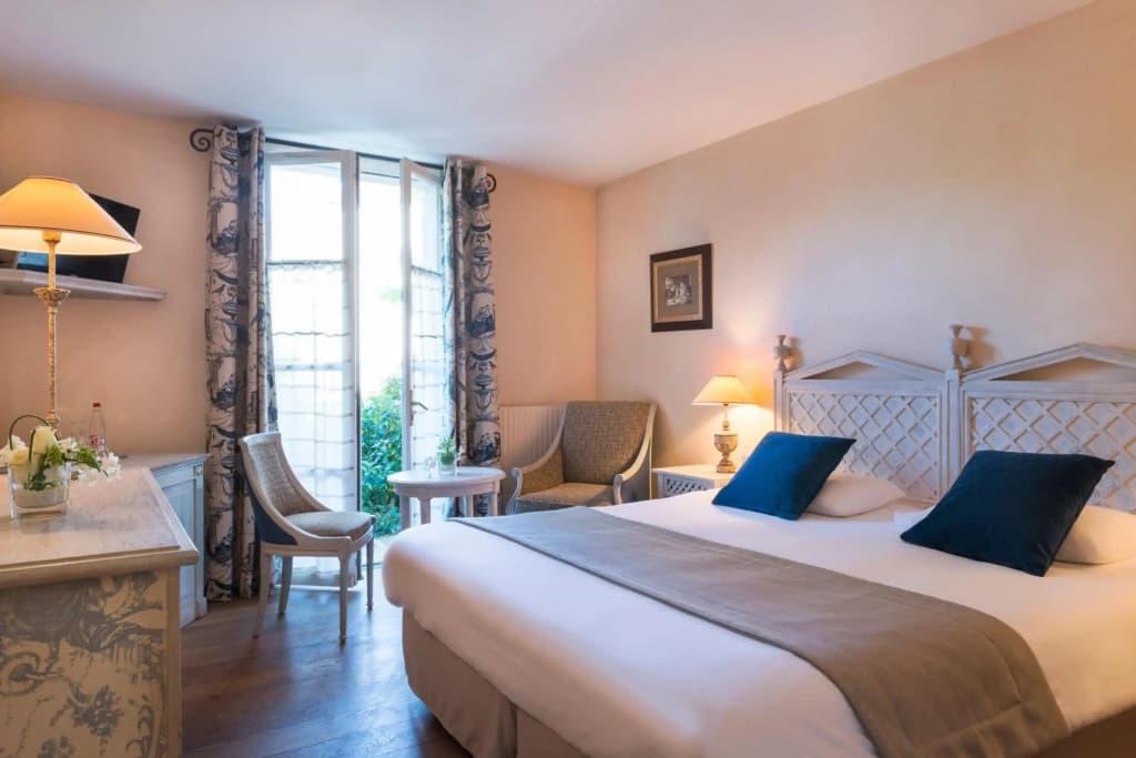 Hôtel Aux Vieux Remparts - Photo 2