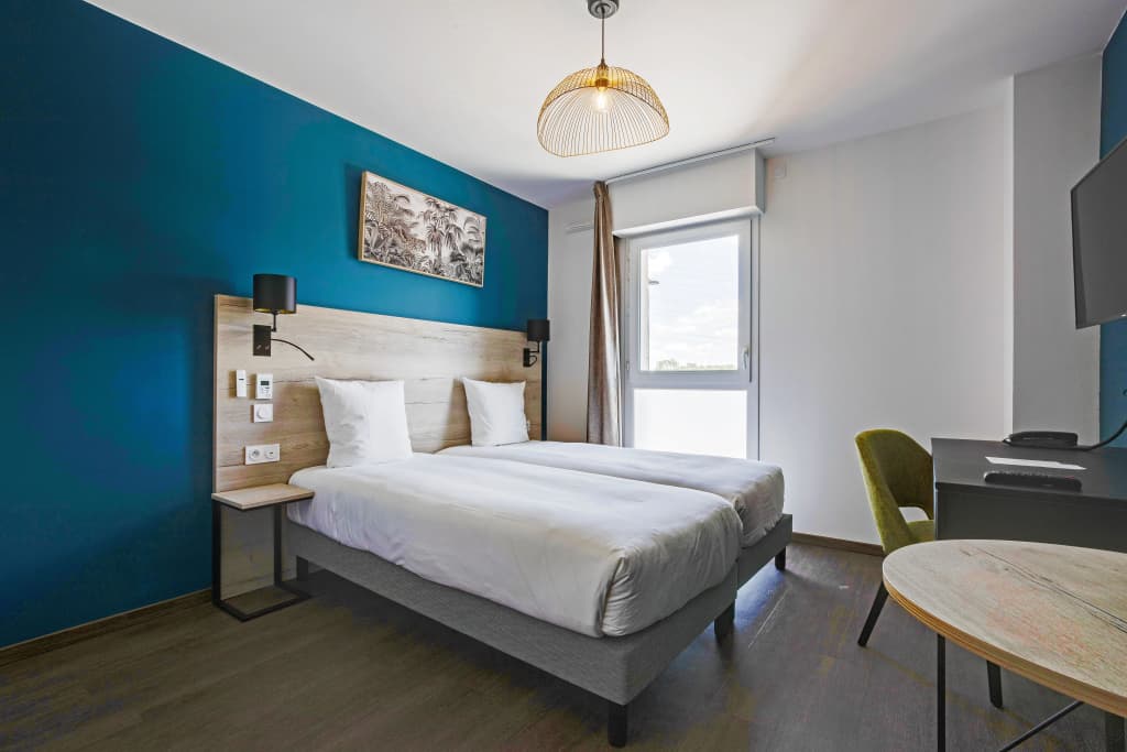 All Suites Appart Hôtel | Palaiseau - Massy TGV - Photo 4