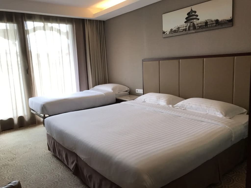 Huatian Chinagora Hotel - Photo 5