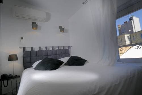 Un Hôtel en Ville - Photo 3