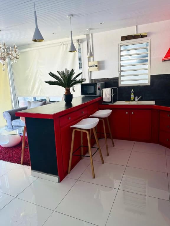 Maison d'une chambre avec piscine partagee terrasse amenagee et wifi a Sainte Rose a 5 km de la plage - Miniature 8