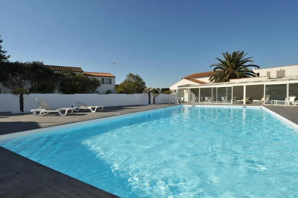 Location dans résidence avec piscine à 50m de la plage - Miniature 6
