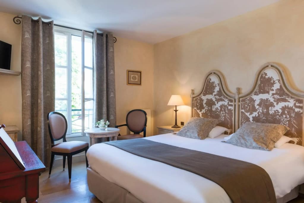 Hôtel Aux Vieux Remparts - Photo 4