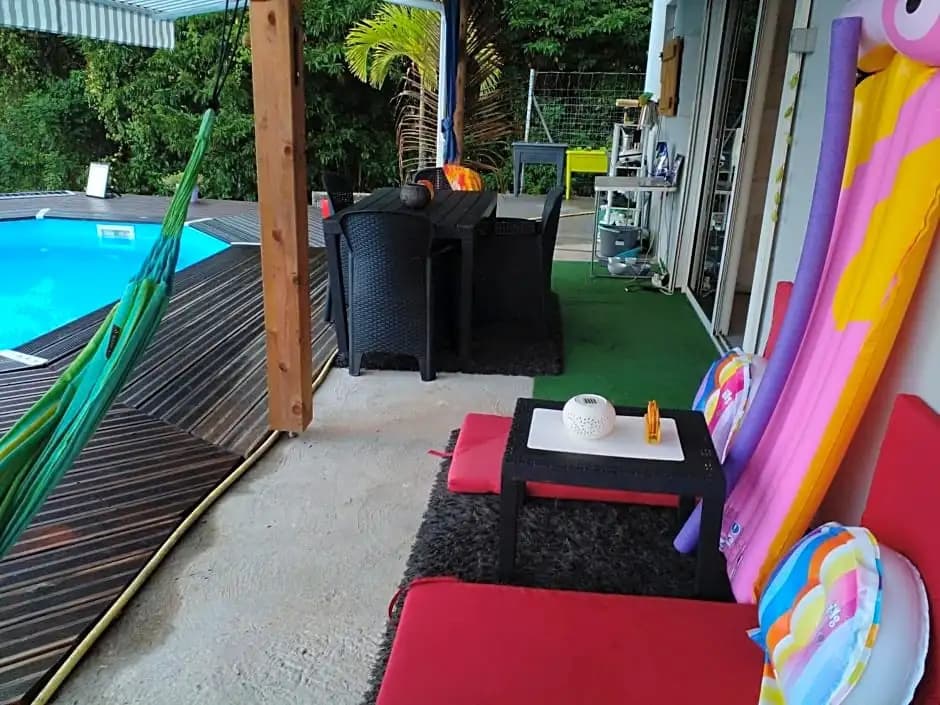 Chambre chez l'habitant avec piscine privative et vue panoramique sur la mer des cara¿s - Miniature 8