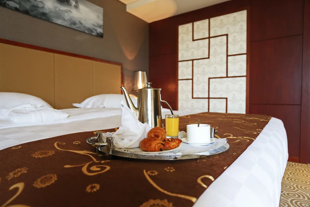 Huatian Chinagora Hotel - Photo 2