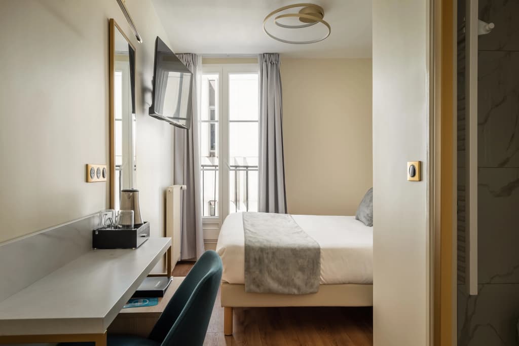 Hôtel Des Deux Avenues - Miniature 6