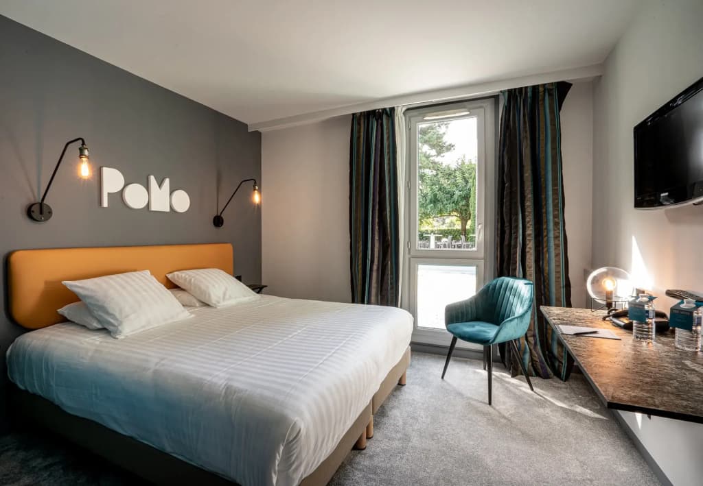 PoMo Hotel & Restaurant - Photo 1