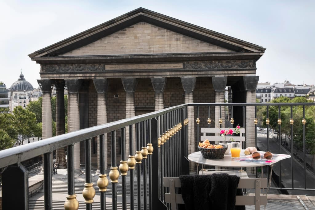 Madeleine Plaza Hotel - Photo 4